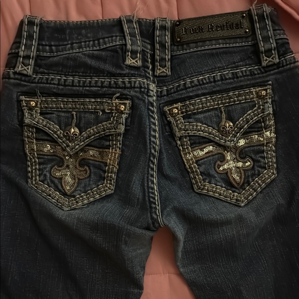 Rock Revival Blue Boot Cut Jeans with Ornate Design